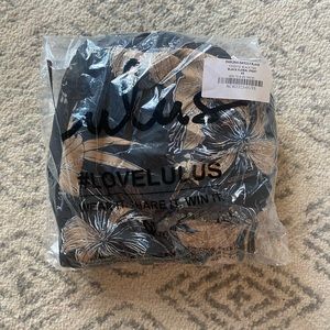 Never been worn black and tan high low maxi floral dress from Lulus.